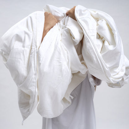 silk filled duvet_front_model holding 
