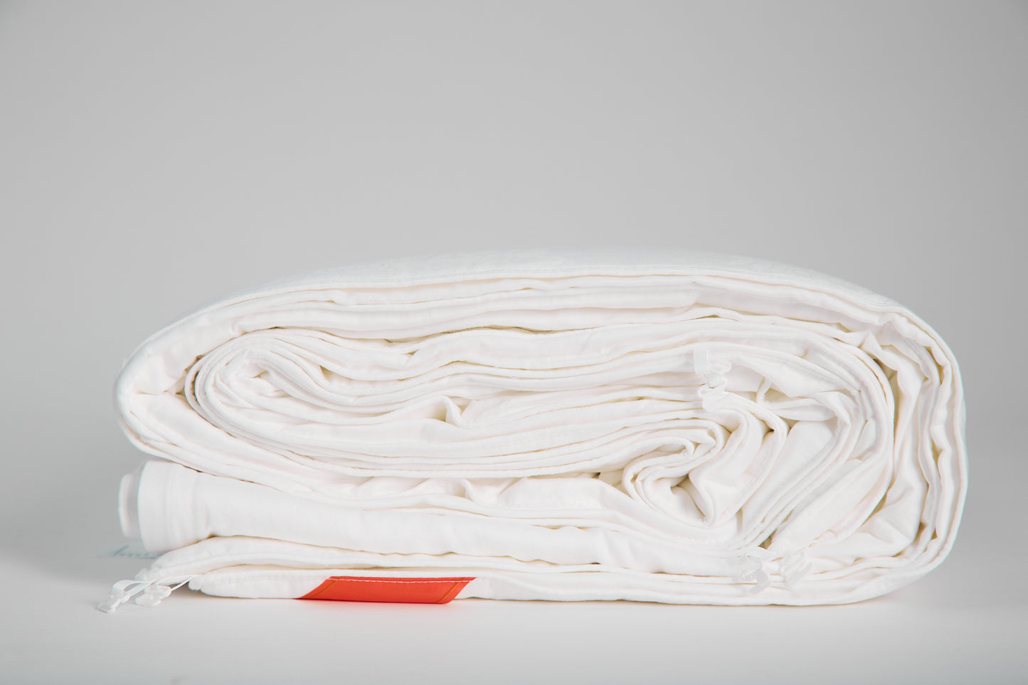 silk filled duvet_front_rolled_side 