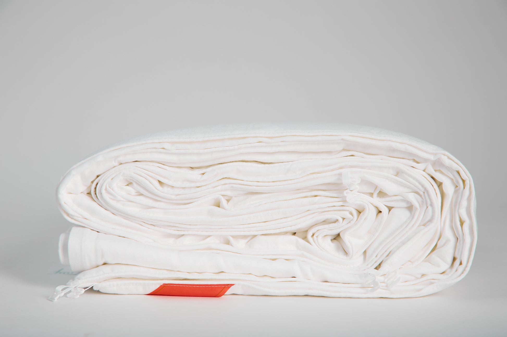 silk filled duvet_front_rolled_side 